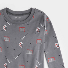 Load image into Gallery viewer, Petit Lem Hockey Gear Print Pyjamas
